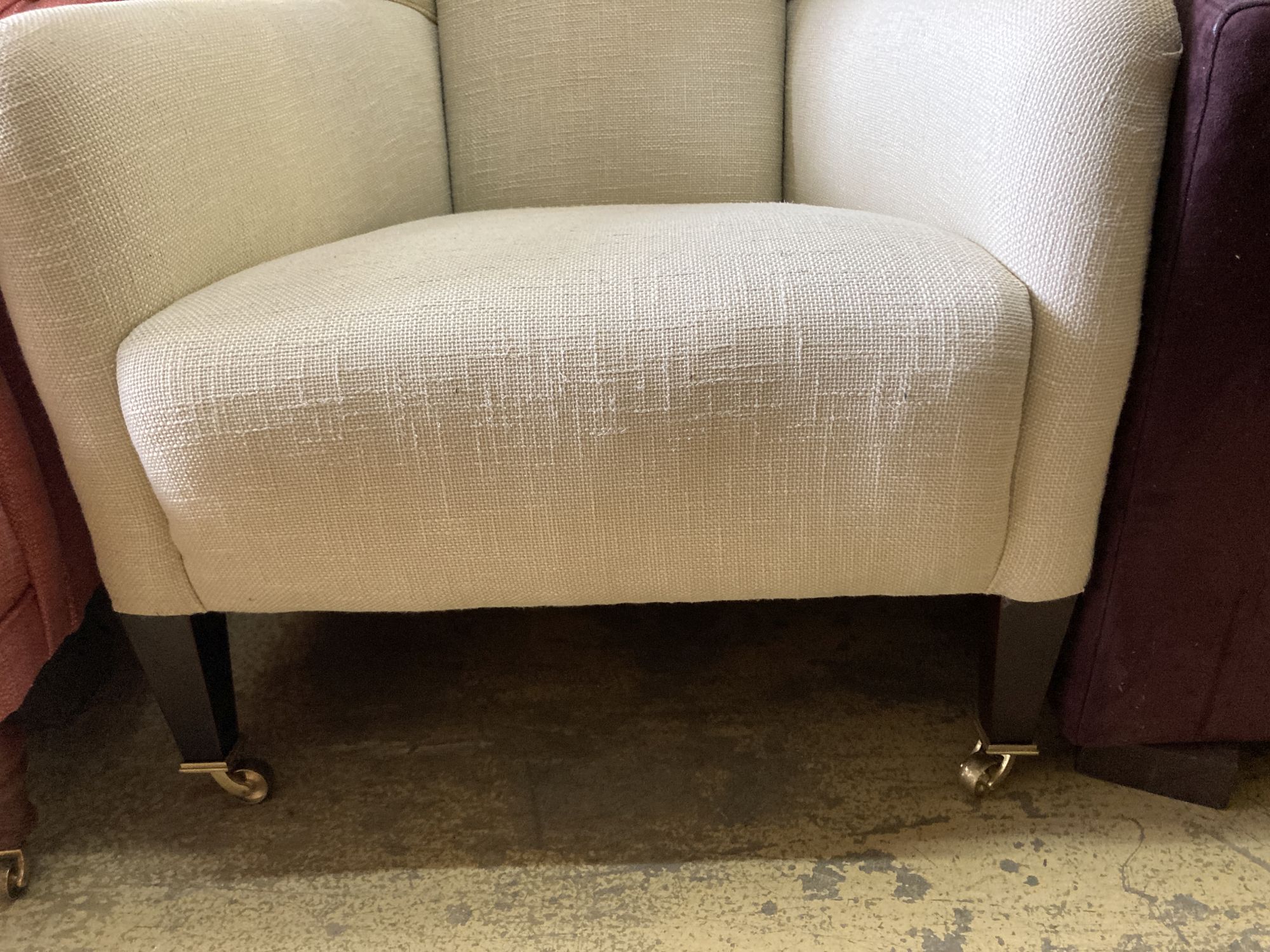 A contemporary upholstered armchair, width 68cm, depth 80cm, height 96cm